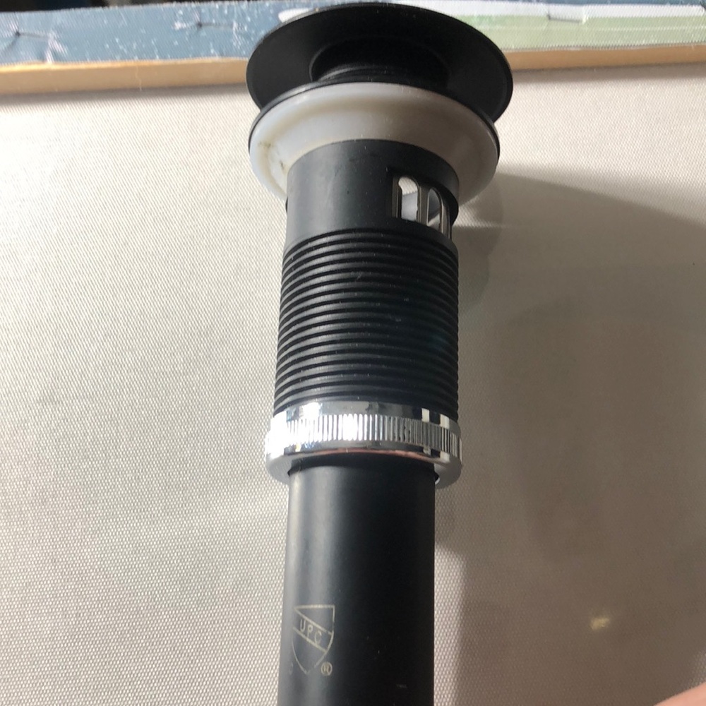 Black and Silver Bathroom Sink Drain